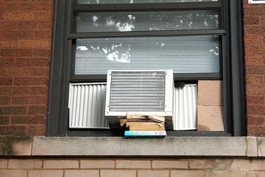 air conditioner hanging out window